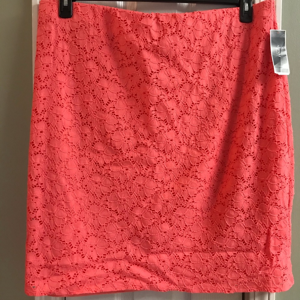 Salmon lace skirt with elastic waist.